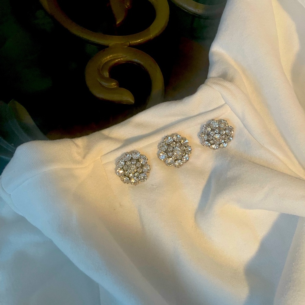 Express white pullover hoodie with front pocket. Crystal decoration on shoulder.